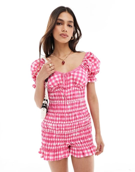 ASOS DESIGN elasticated channel lace trim bow playsuit in pink gingham - Image 1
