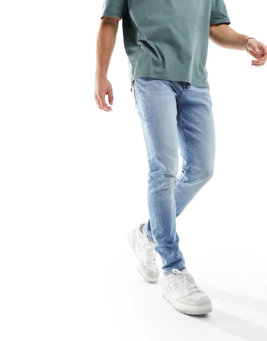 ASOS DESIGN skinny jeans i ljus tvättad blå - Image 4