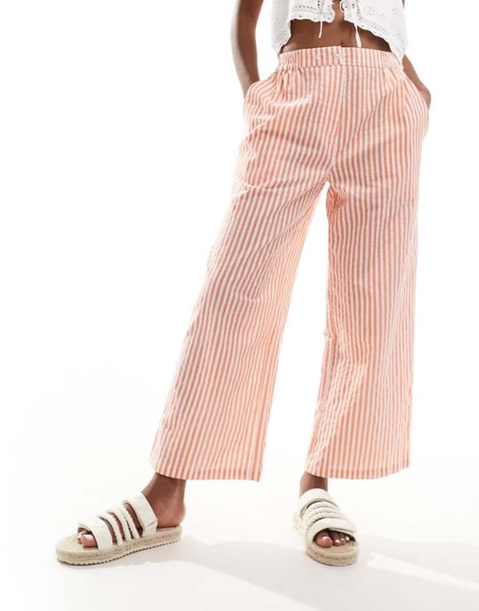 ASOS DESIGN cropped byxor med resårmidja i orange rand - Image 1