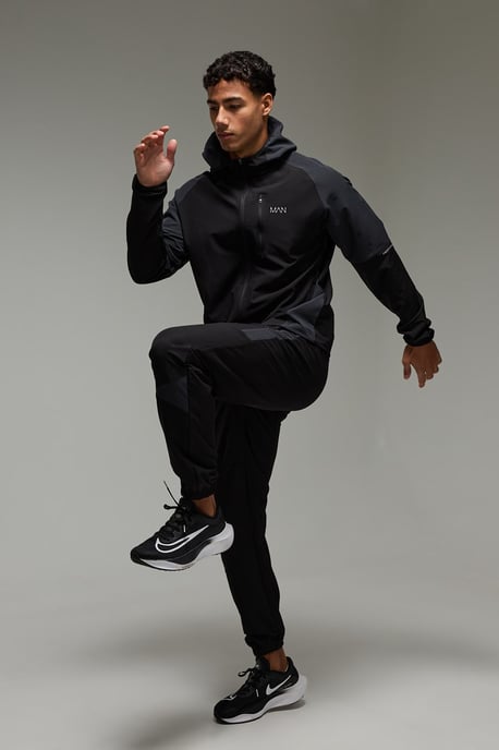 Man Active Colour Block Stretch Woven Regular Fit Tracksuit - Image 1