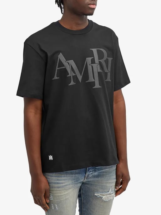 Staggered Logo Print T-Shirt in Black - Image 1