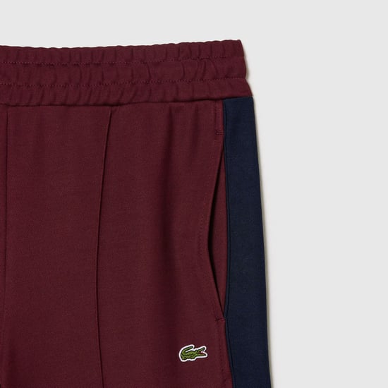 Lacoste damesjoggingbroek met open zoom en geweven details in rood - Image 5