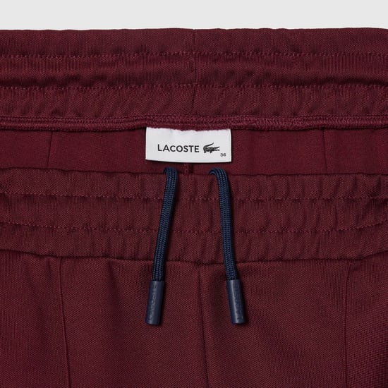 Lacoste damesjoggingbroek met open zoom en geweven details in rood - Image 6