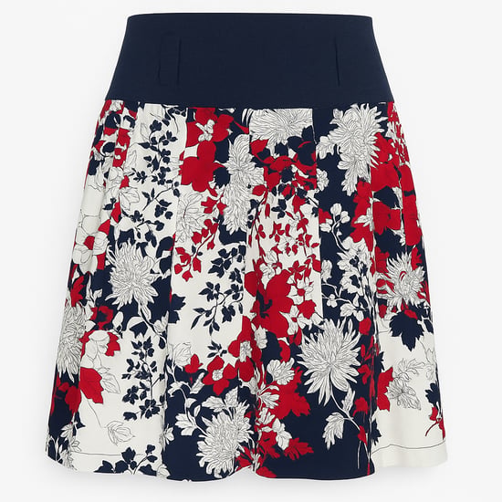 Geplooide A-lijn rok met bloemenprint en contrasterende marineblauwe tailleband. - Image 1