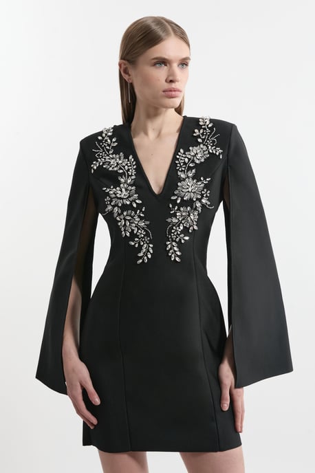 Bandage Form Fitting Cape Sleeve Embellished Mini Dress - Image 1