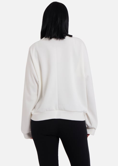 Krämfärgad oversized tröja med rosett fram - Image 4