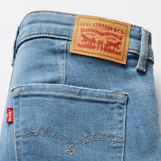 Women's Levis 712 Slim-Fit Jeans in Blue - Image 4