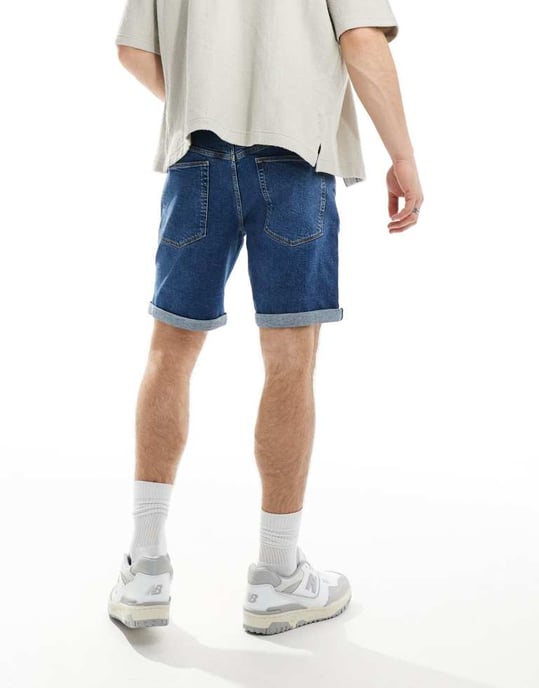 ASOS DESIGN stretch slim regular längd denimshorts i medelblå tvätt - Image 2