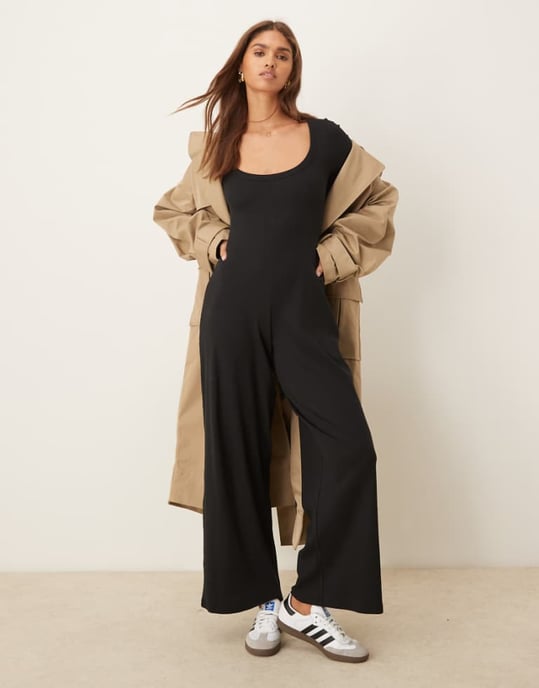 ASOS DESIGN ribbad långärmad kroppsnära jumpsuit i svart - Image 1