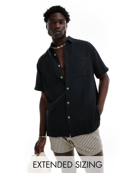 ASOS DESIGN kortärmad avslappnad skjorta med revere-krage i textil i svart - Image 1