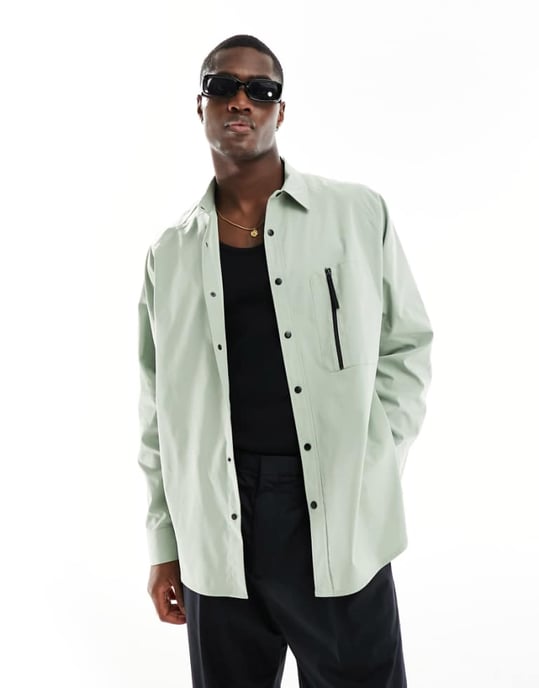 ASOS DESIGN boxig oversized nylon skjorta med funktionella detaljer i grön - Image 1