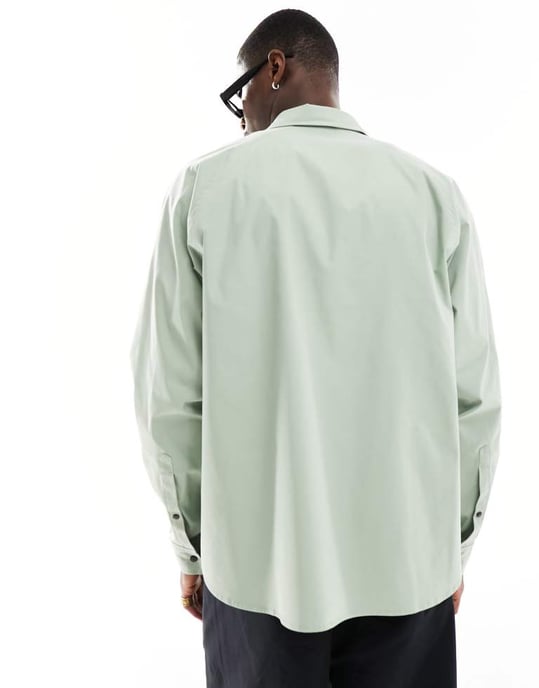 ASOS DESIGN boxig oversized nylon skjorta med funktionella detaljer i grön - Image 4