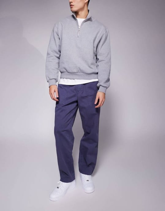 ASOS DESIGN tapered dragbyxa med snickardetaljer i mörkblått - Image 1
