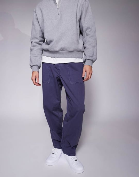 ASOS DESIGN tapered dragbyxa med snickardetaljer i mörkblått - Image 4