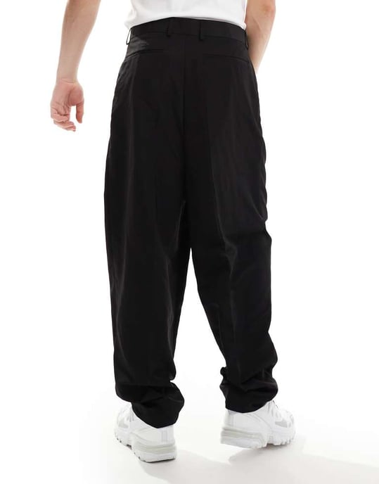 ASOS DESIGN smart avslappnade byxor med tappad ben i svart med halv elastisk midja - Image 3