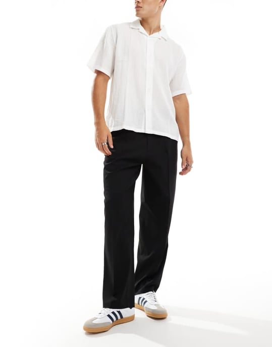 ADPT wide fit trousers in black with front pleat - Image 1