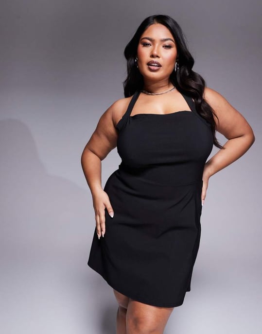 In The Style Plus x Natalya Wright exclusive tailored halterneck mini dress in black - Image 2
