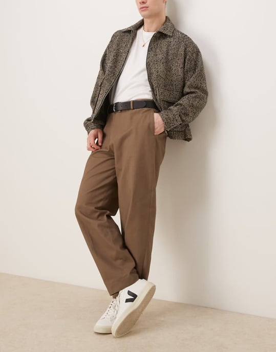 ASOS DESIGN smart oversized tapered cotton chino trousers with front pleat in khaki - Image 1