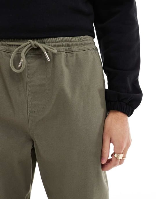 ASOS DESIGN tapered pull on chino with elasticated waist in khaki - Image 4