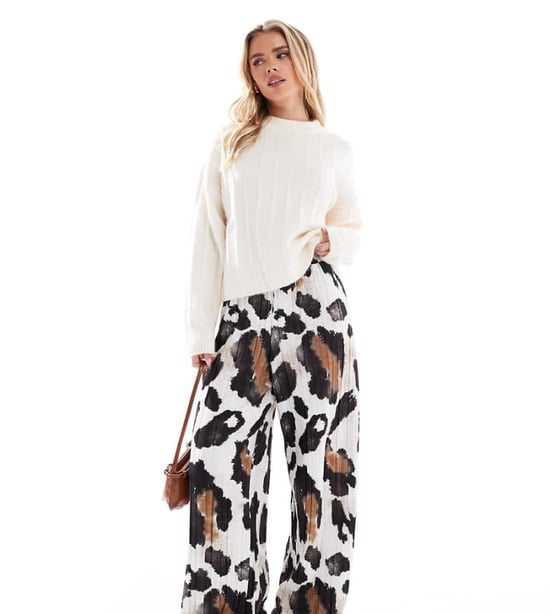 Vero Moda Petite plisse wide leg trousers in abstract cow print - Image 1