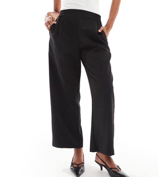 ASOS DESIGN Petite barrel leg pull on tailored trouser in black - Image 1