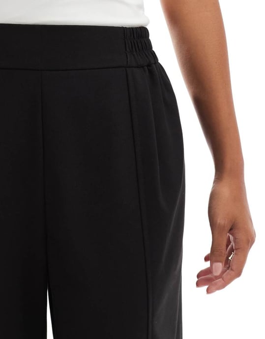 ASOS DESIGN Petite barrel leg pull on tailored trouser in black - Image 3