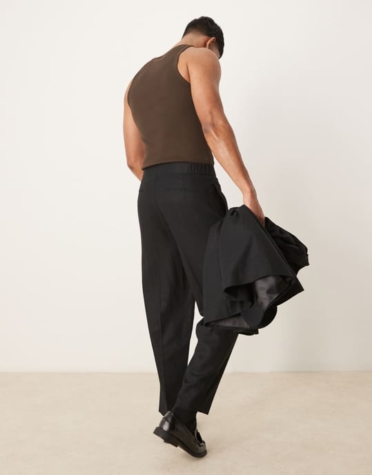 ASOS DESIGN linen blend oversized tapered suit trousers in black twill - Image 4
