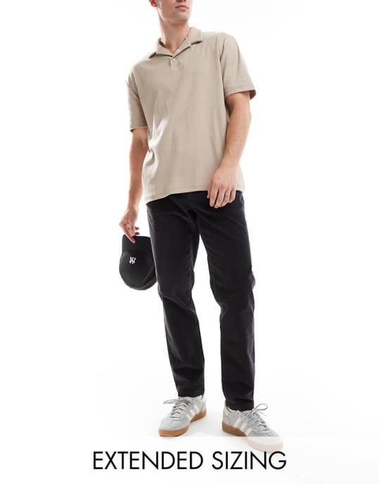 ASOS DESIGN tapered fit cord trouser in navy - Image 1