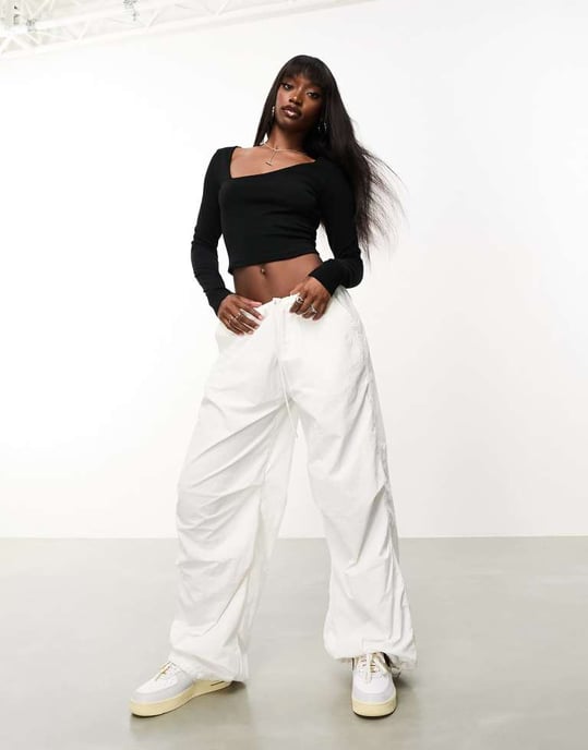 ASOS DESIGN cotton asymmetric scooped neck long sleeved crop top in black - Image 3