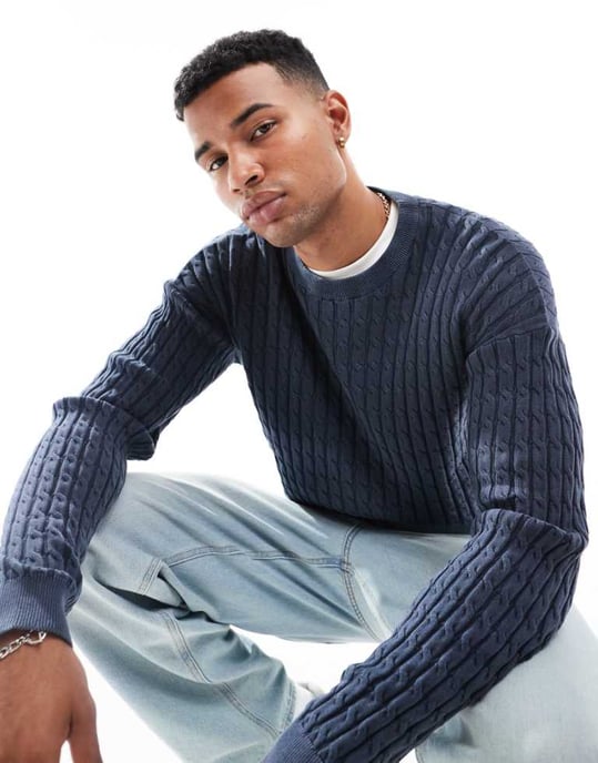 ASOS DESIGN relaxed washed knitted cable knit jumper in navy - Image 1