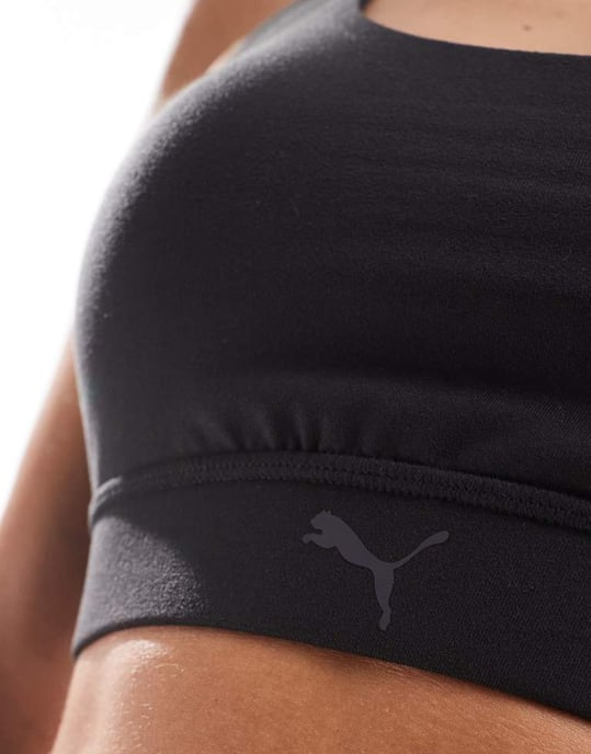 Puma Evolve Training mid impact support sports bra in black - Image 2