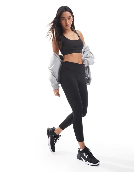 Puma Evolve Training mid impact support sports bra in black - Image 4