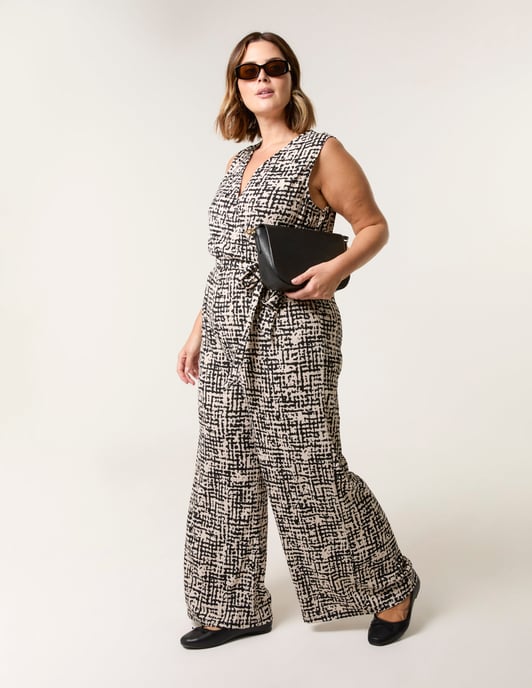 Curve Sleeveless Belted Jumpsuit - Image 1