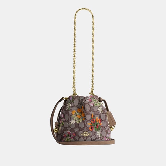 Faye Mini Drawstring Bag In Signature Jacquard With Floral Embroidery - Image 1