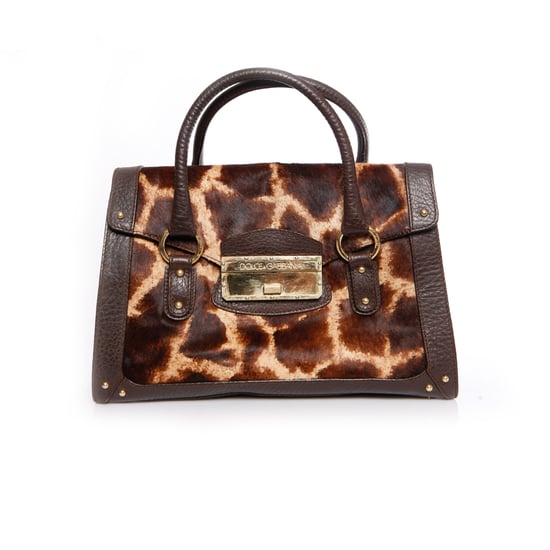 Dolce & Gabbana, Handväska med brunt läder och girafftryck i kalvhår. - Image 1