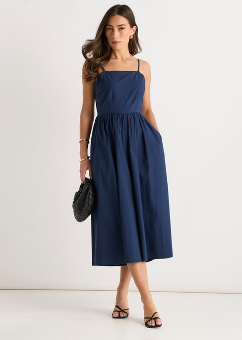 Marineblauwe jumpsuit met wijde pijpen en bandjes - Image 1