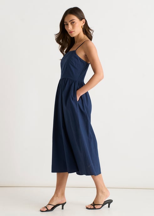 Marineblauwe jumpsuit met wijde pijpen en bandjes - Image 3