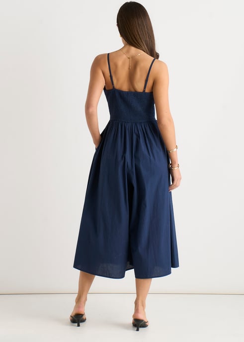 Marineblauwe jumpsuit met wijde pijpen en bandjes - Image 4