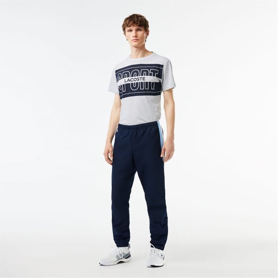 Men's Lacoste Solid Patterned Slim Joggers in Navy Blue/White - Image 1