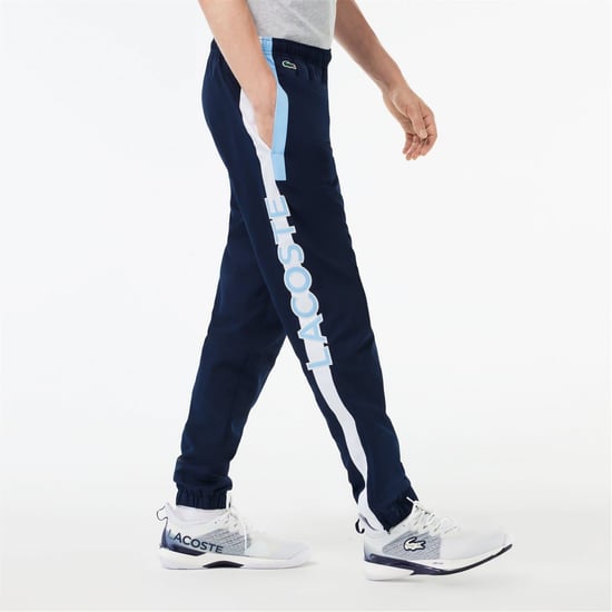 Men's Lacoste Solid Patterned Slim Joggers in Navy Blue/White - Image 2