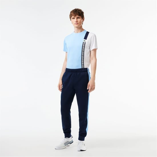 Men's Lacoste Vertical Logo Color Block Slim Cut Track Pants in Navy Blue - Image 1
