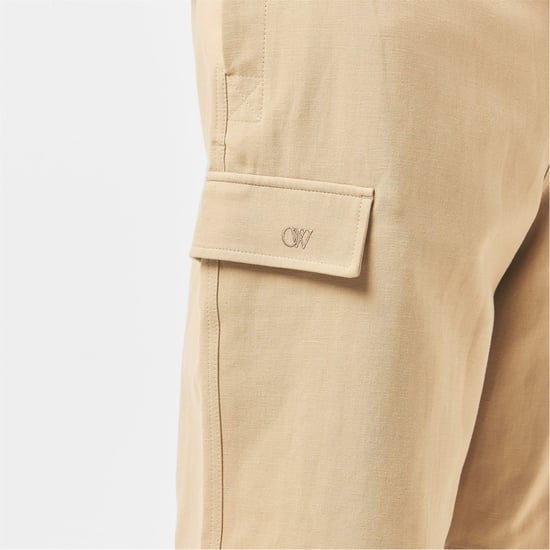 Men's Off White Solid Patterned Relaxed Fit Cargo Shorts in Sand - Image 2