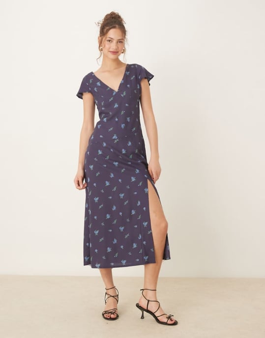 ASOS DESIGN v neck flutter sleeve midi tea dress in navy ditsy floral print - Image 1