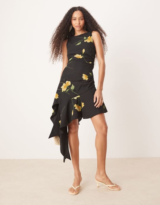 ASOS DESIGN asymmetric frill hem midi dress in black and yellow floral print - Image 1