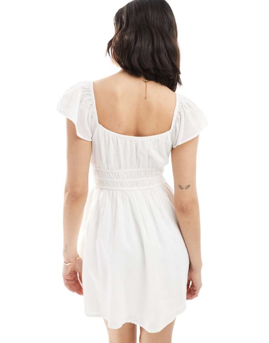 Hollister short sleeve shirred waist detail mini skater dress in white - Image 4