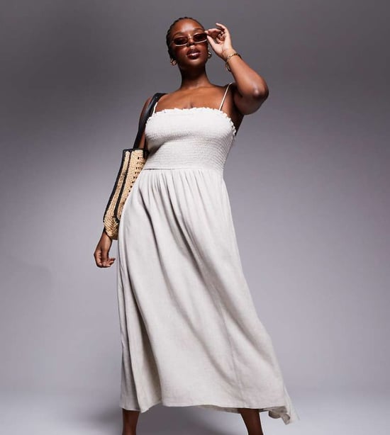 ASOS DESIGN Curve Isabel linen blend shirred bandeau beach sundress in natural - Image 1
