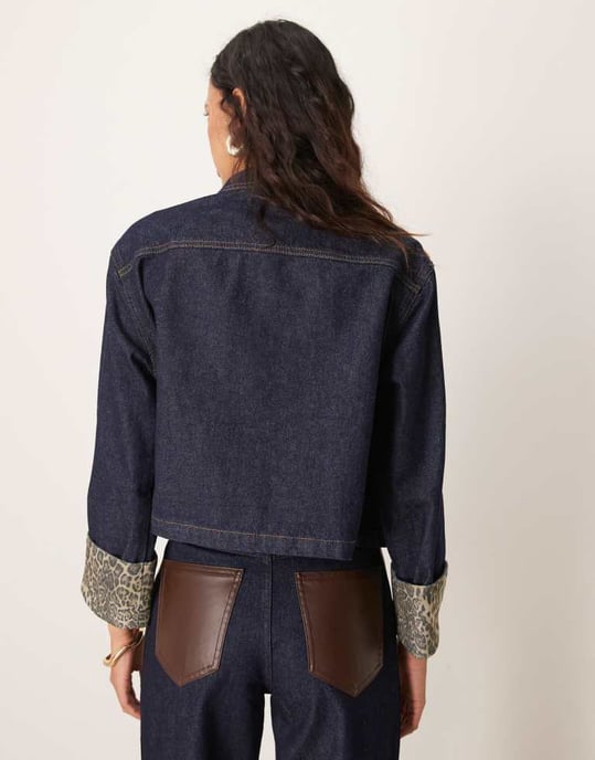 ASOS DESIGN denim jacket with leopard print turn up cuffs in indigo - Image 3