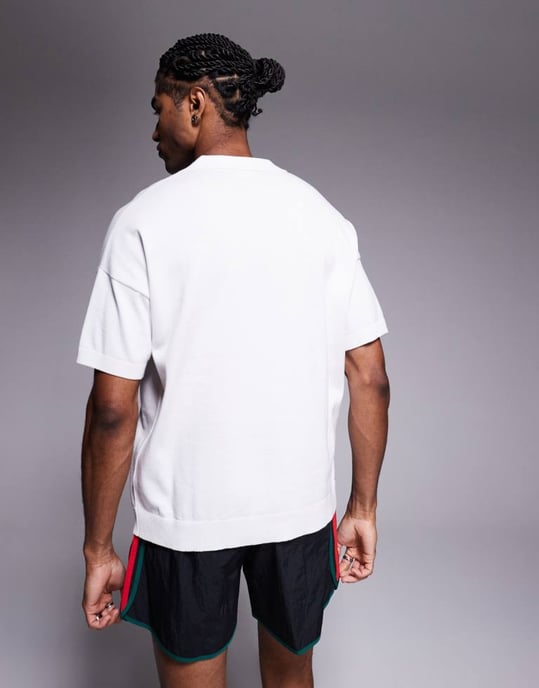 ASOS DESIGN relaxed knitted midweight cotton notch neck polo in white - Image 4