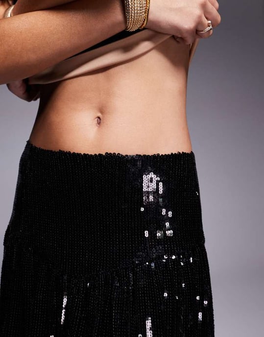 ASOS DESIGN paljettkjol med drop waist och bubbelfåll i svart - Image 4