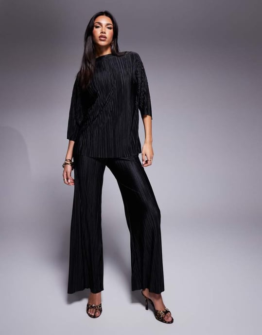 ASOS DESIGN 2 in 1 plisse faux cord jumpsuit in black - Image 1
